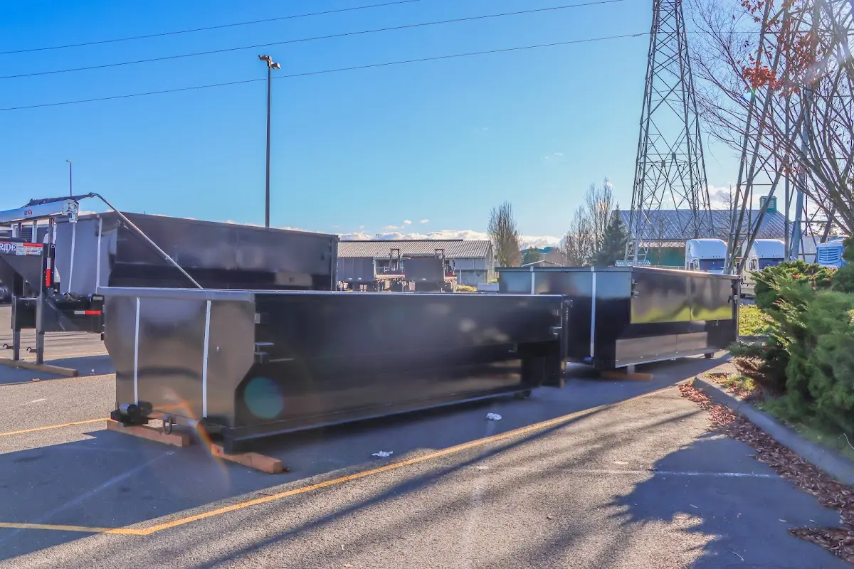 Roll-off dumpster ready for waste disposal at job site for 12 Yard Dumpster Rental in Bonney Lake